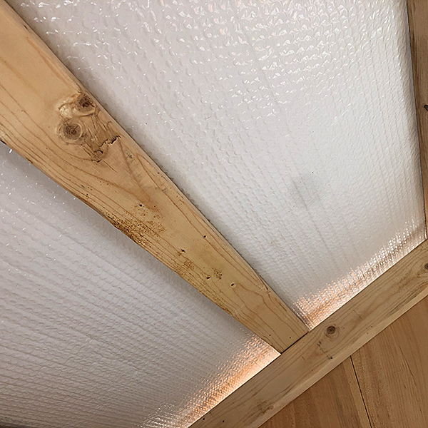 insulated ceiling with wood structure