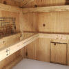 wood interior with roost bar and ventilation opening